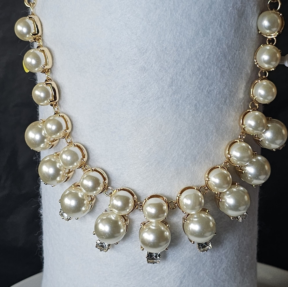 gorgeous heavy bib pearlish necklace. i believe it is j crew